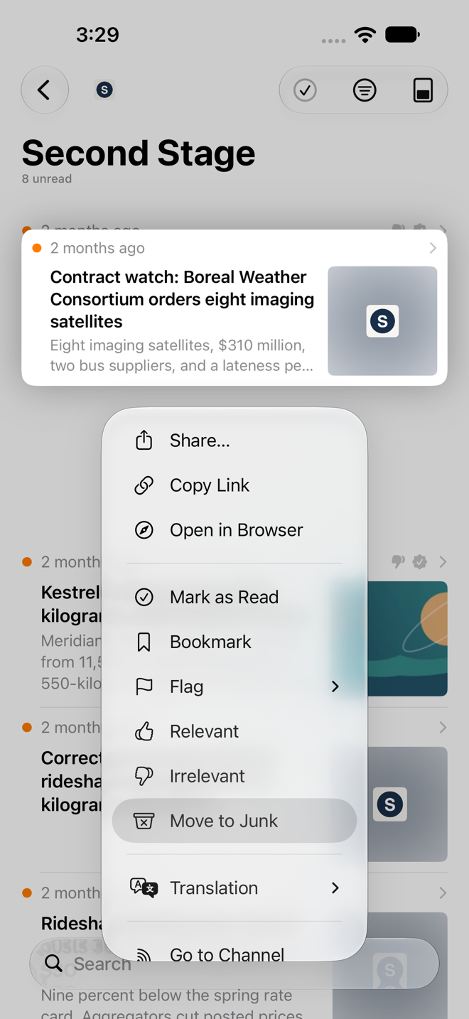Long-press menu on an article preview with Move to Junk listed among the article actions.